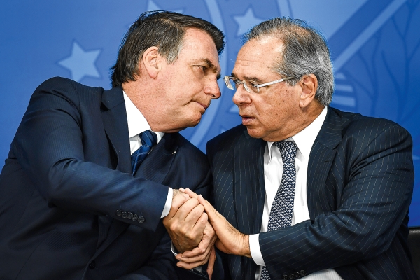 O presidente Bolsonaro e o ministro Paulo Guedes
