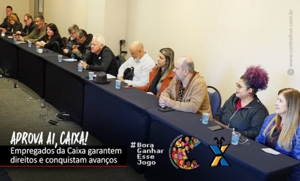 Rogério Campanate na mesa de negociação (de casaco marrom)